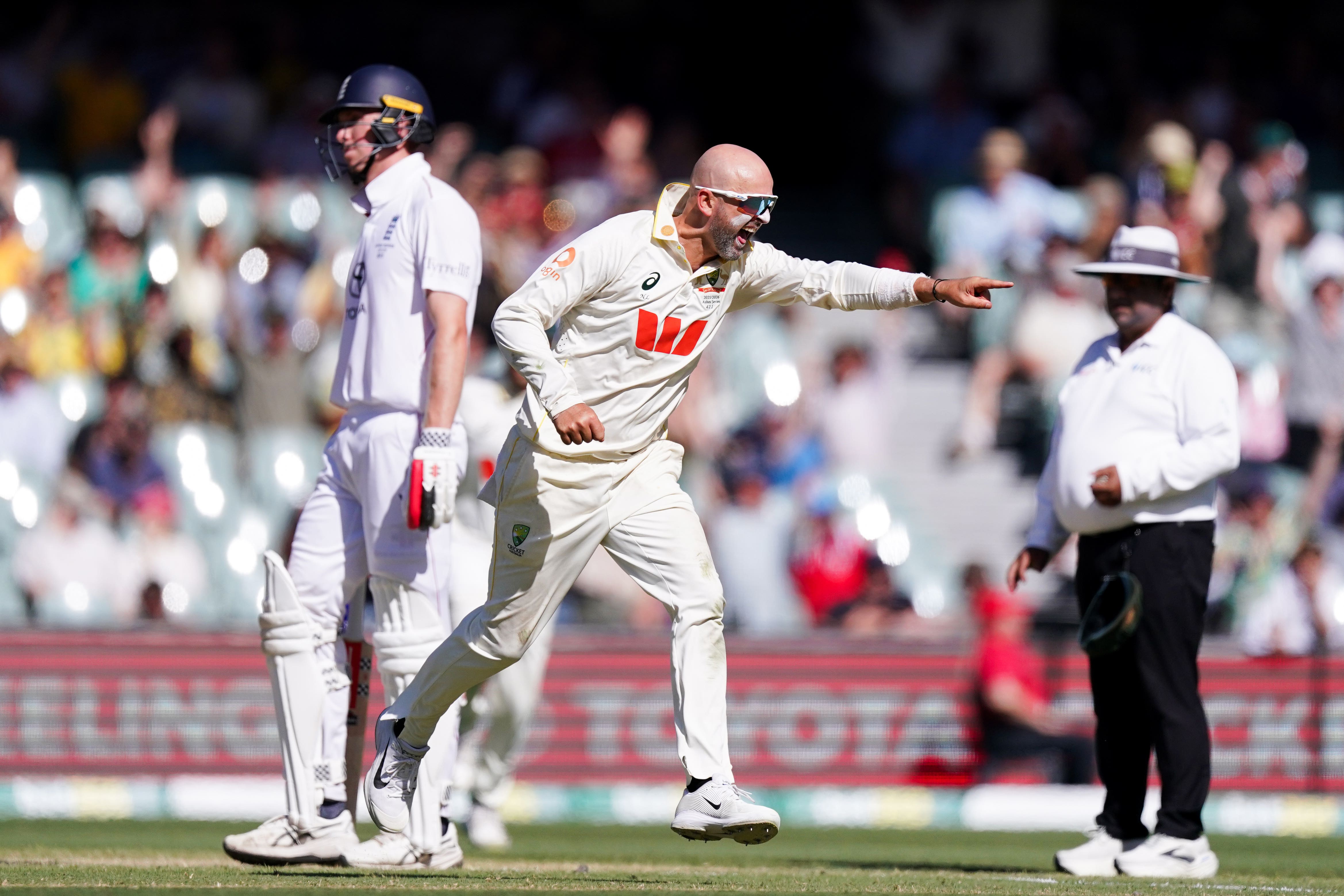 Nathan Lyon celebrates the wicket of England’s Ben Stokes on day four (Robbie Stephenson/PA)