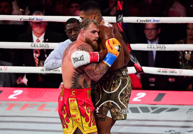 <p>Jake Paul (left) during his defeat by Anthony Joshua</p>
