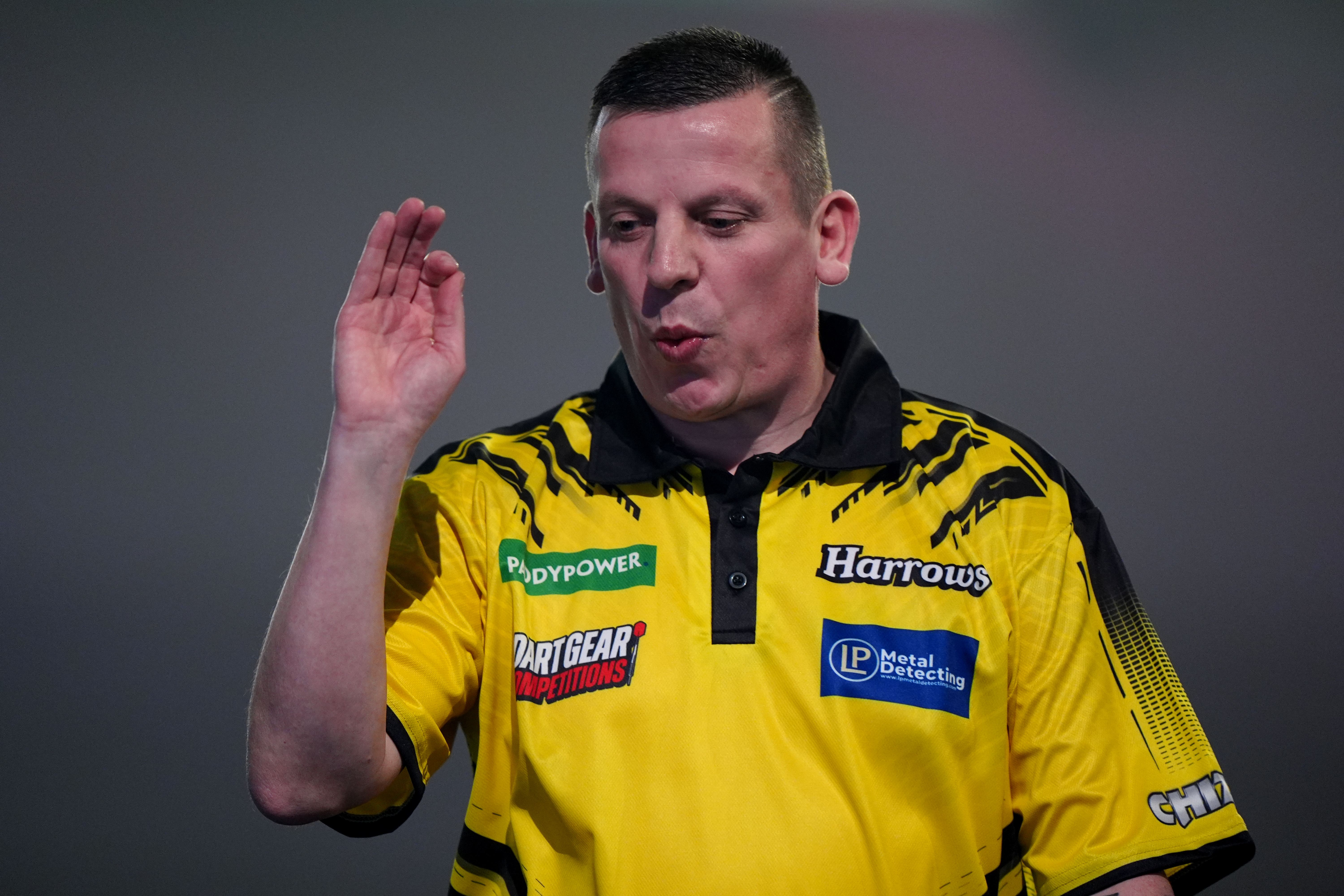 England’s Dave Chisnall crashed out of the PDC World Championship at Alexandra Palace (Bradley Collyer/PA)