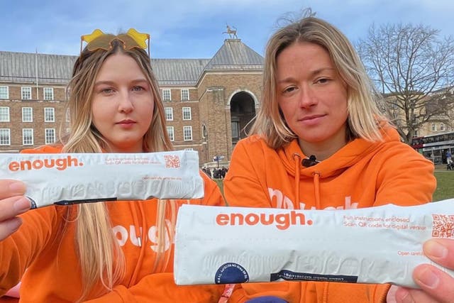 <p>Katie White, right, in Bristol with a student volunteer for her non-profit rape-prevention company Enough</p>