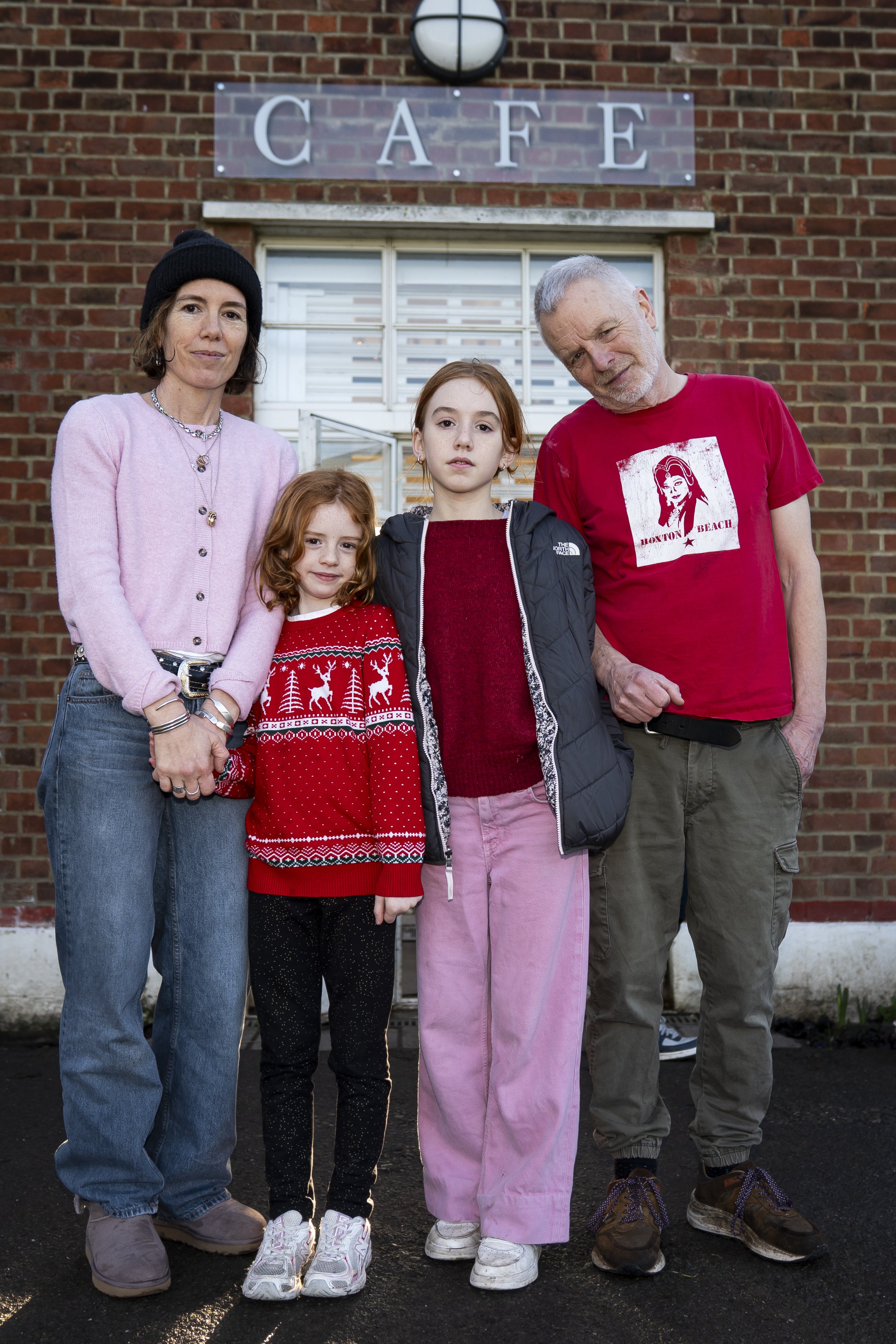 Emma Fernandez and Patrick Matthews, pictured with their children, have run the cafe at Hampstead Heath Lido for 10 years