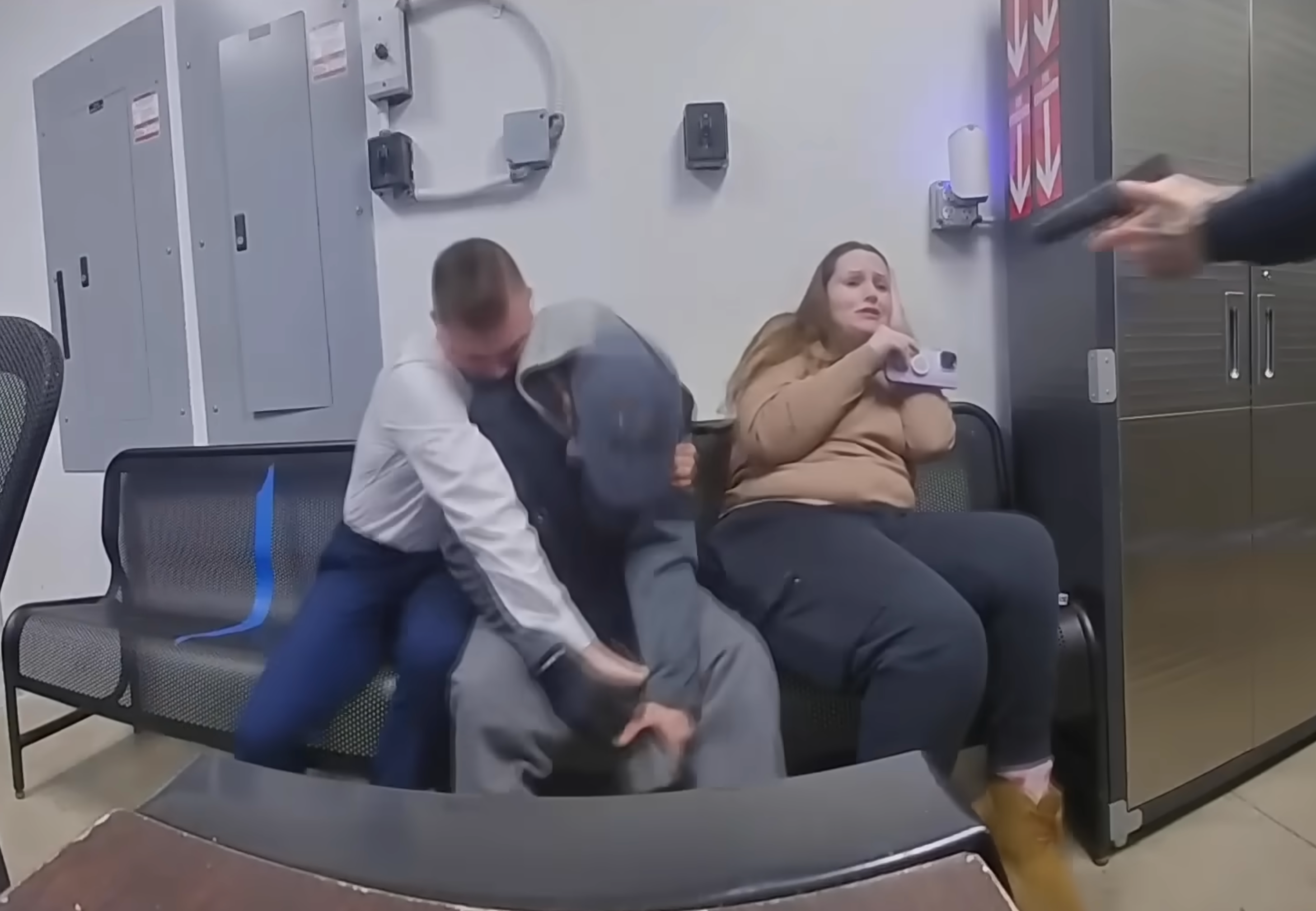 A Walmart employee intervened, ultimately disarming Newton as Katerina Jeffrey, sitting next to him, yelled for him to stop