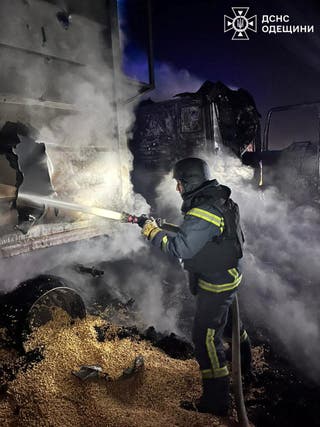 A firefighter works at the site of a Russian missile and drone strike in Odesa