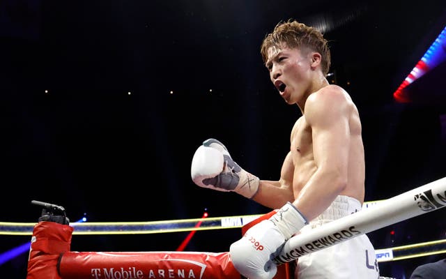 <p>Naoya Inoue celebrates stopping Ramon Cardenas after surviving a knockdown</p>