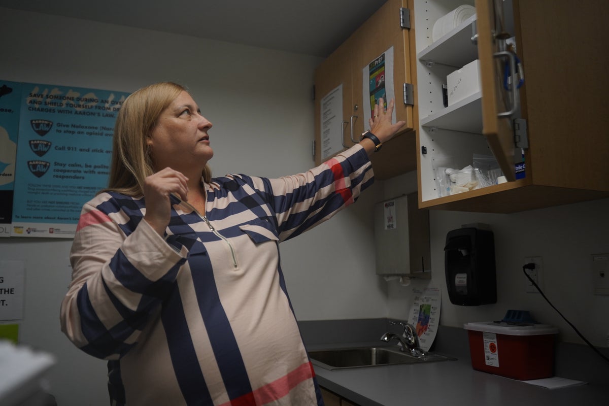 Addiction-stricken community struggles to keep a syringe program going after Trump's order