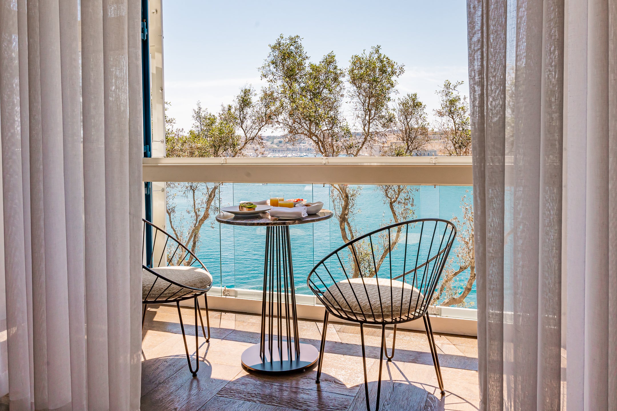 Balconies at Iniala Harbour House are built for a good book