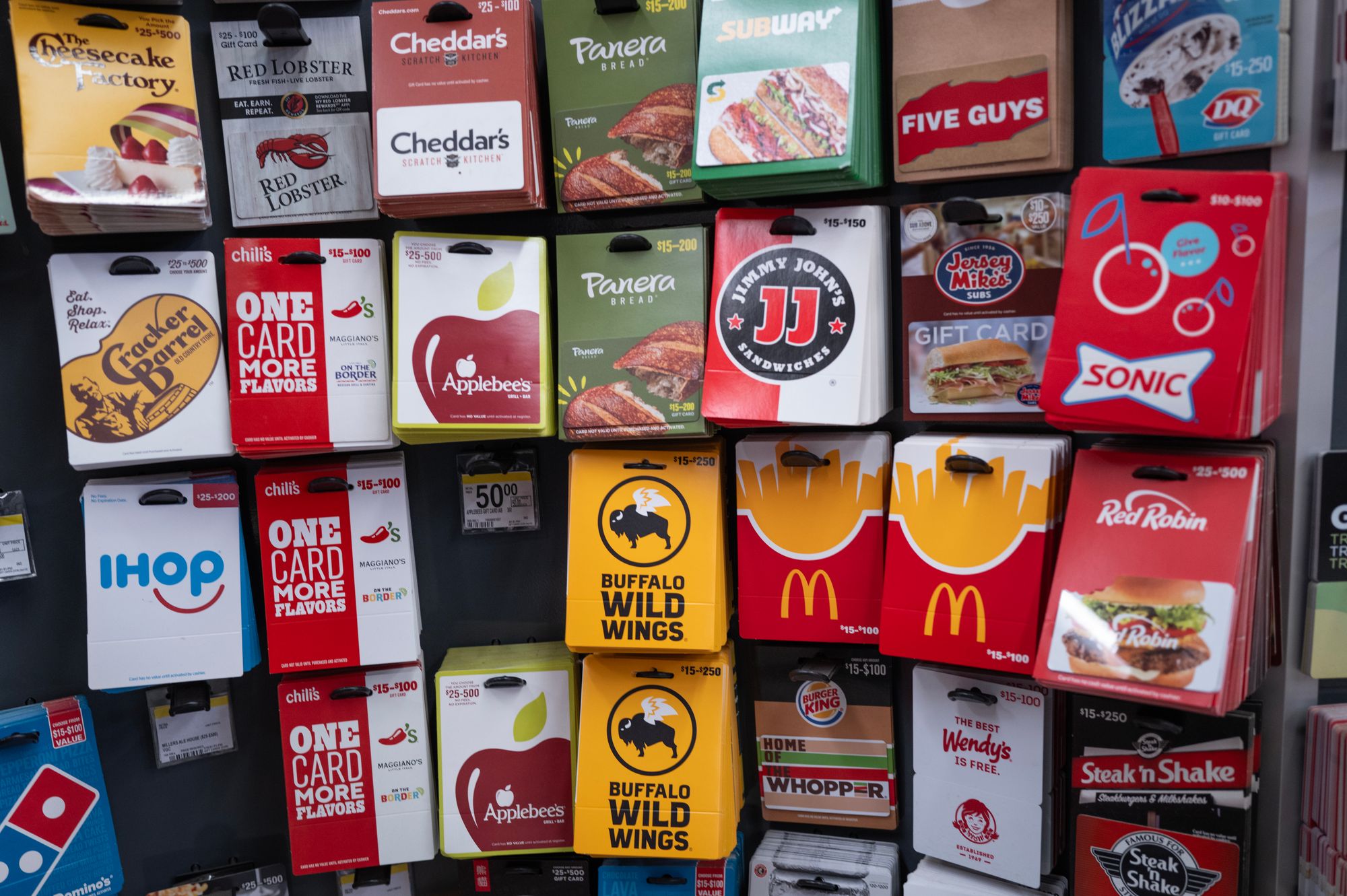 <p>Three men have been arrested in a $14 million gift card scheme where they stole from 10 stores a day for months, according to officials</p>