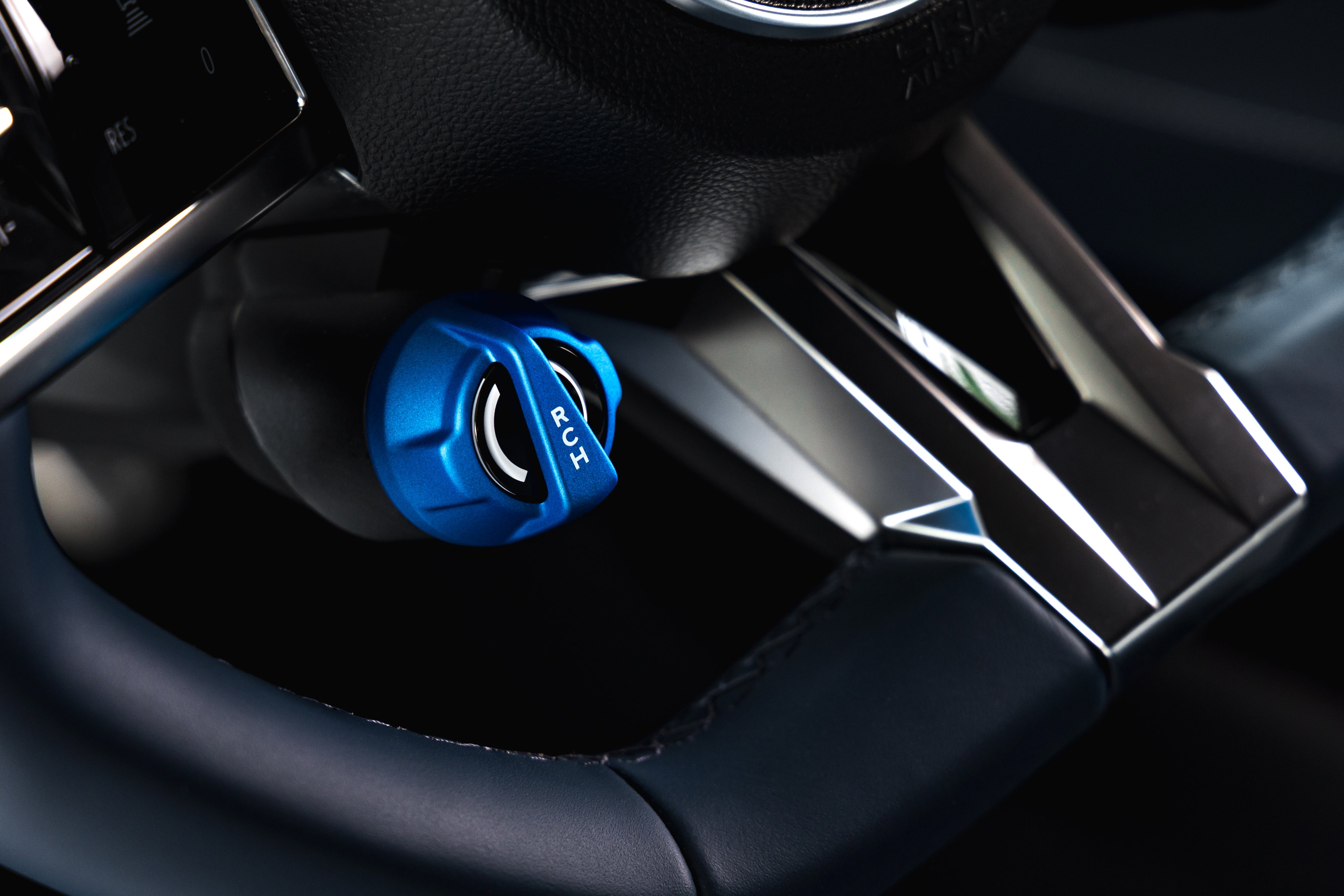 A metallic switch to control brake regeneration is one of only a few bits of visual drama in the A390's cabin