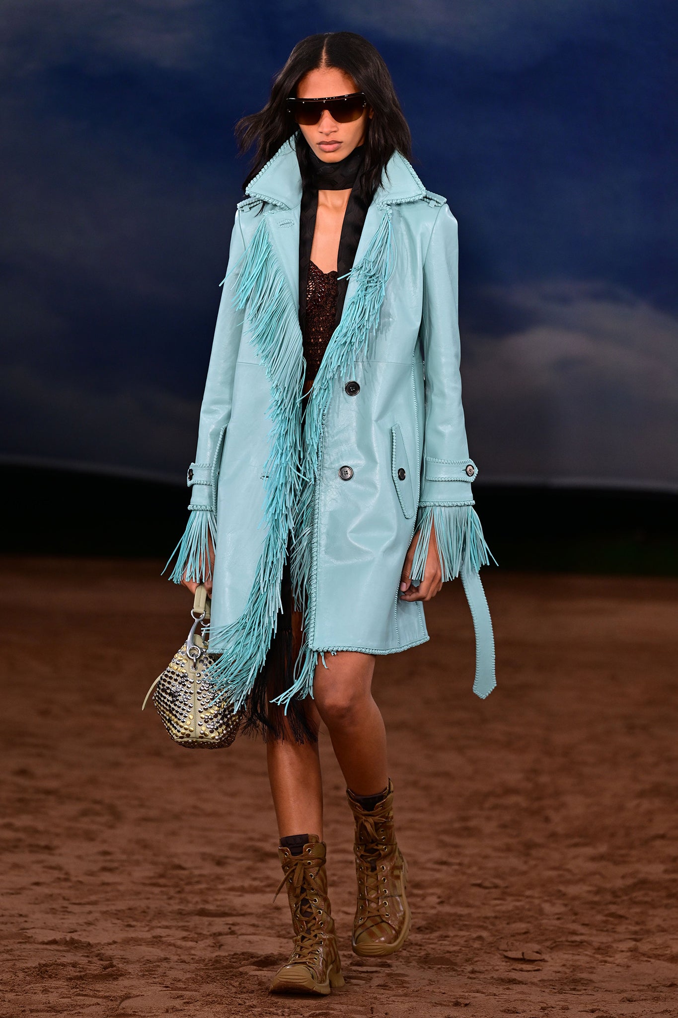 Burberry added blue fringe trims to its signature trench coats at London Fashion Week