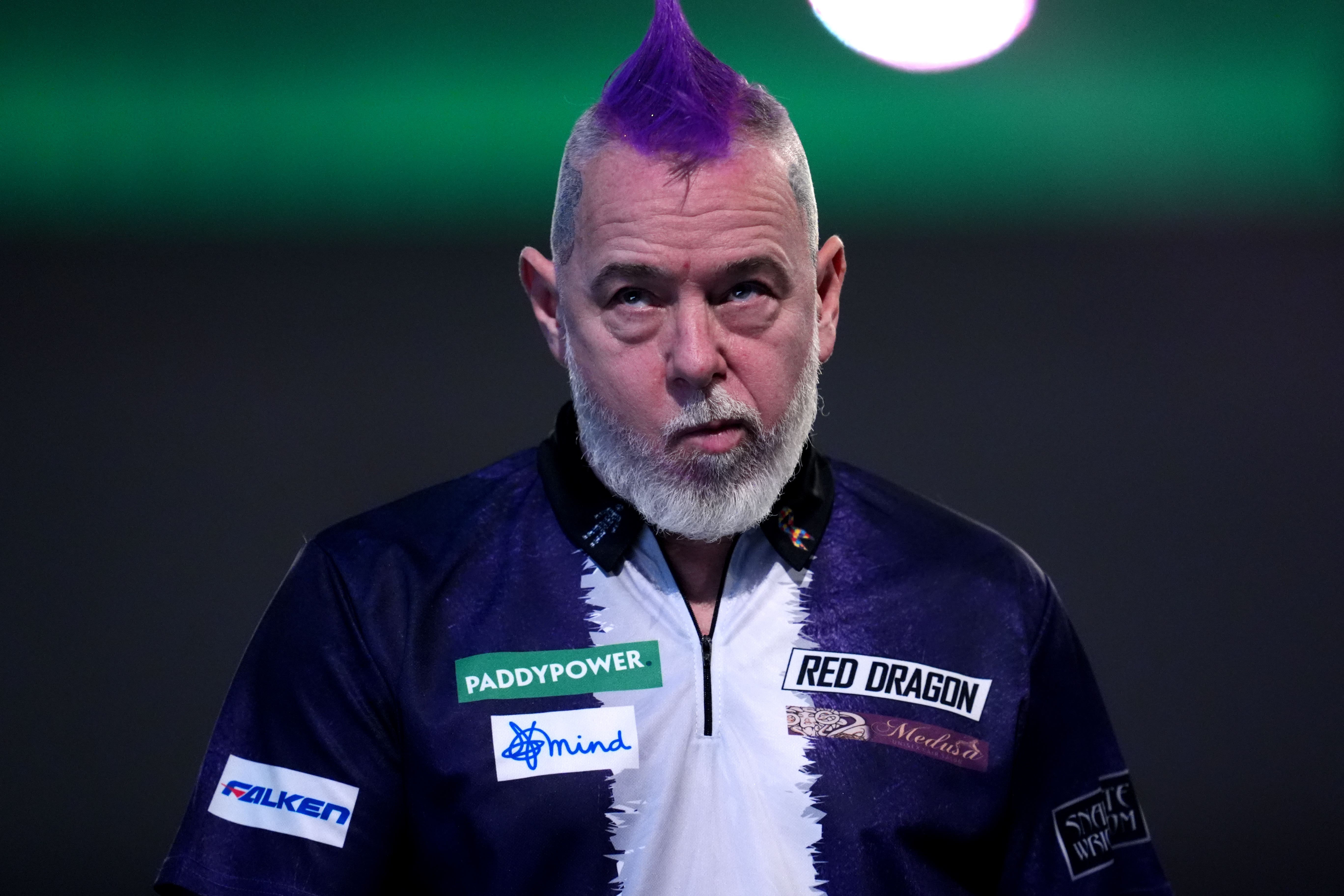 Peter Wright is out of the World Championship (Adam Davy/PA)