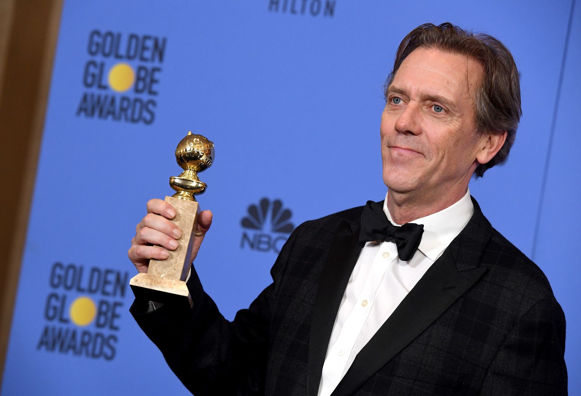 Laurie won a Golden Globe for his star tarn as arms dealer Richard Roper