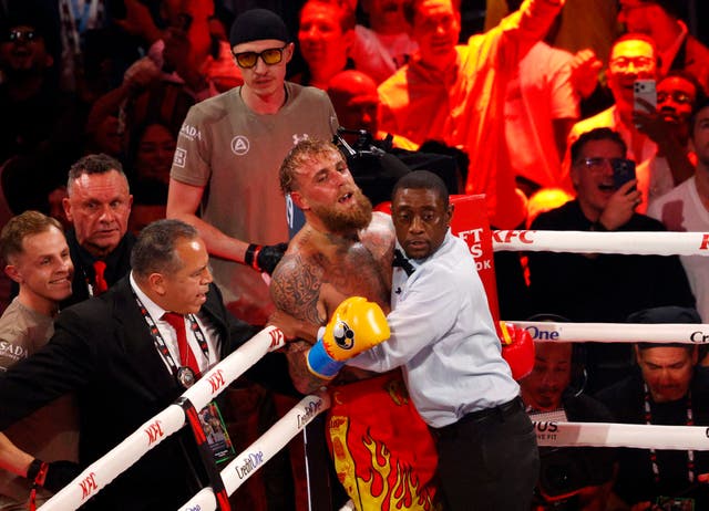 <p>Jake Paul reacts after defeat against Anthony Joshua</p>