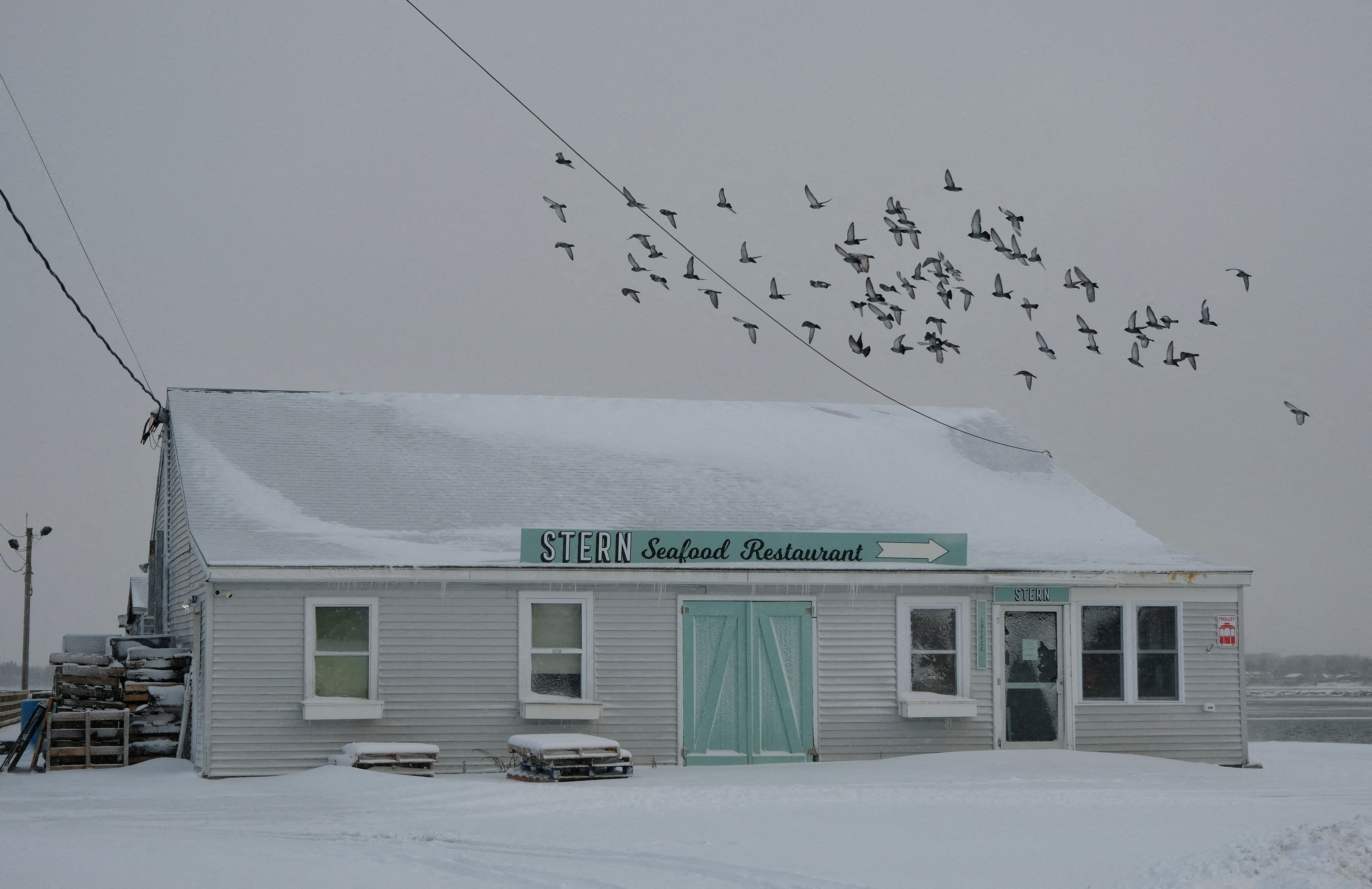 A closed-for-the-season seafood restaurant at Pine Point in Scarborough, Maine. A winter storm bringing blizzard conditions, high winds, and ice accumulation began moving east across the midwest on Sunday morning, and will disrupt the Great Lakes and northeast until early Monday