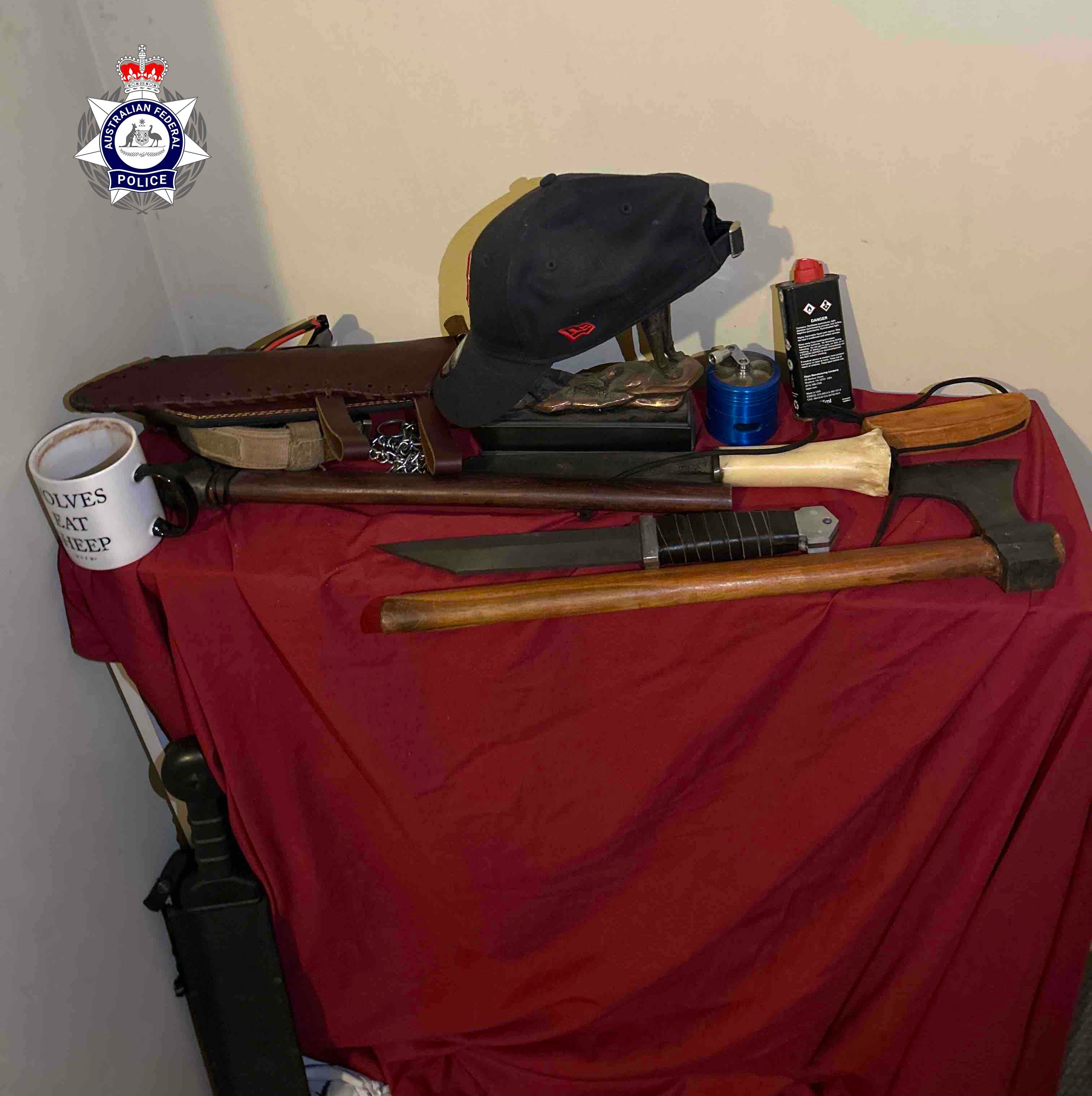 Police confiscated weapons, including axes and knives, from the British man’s home