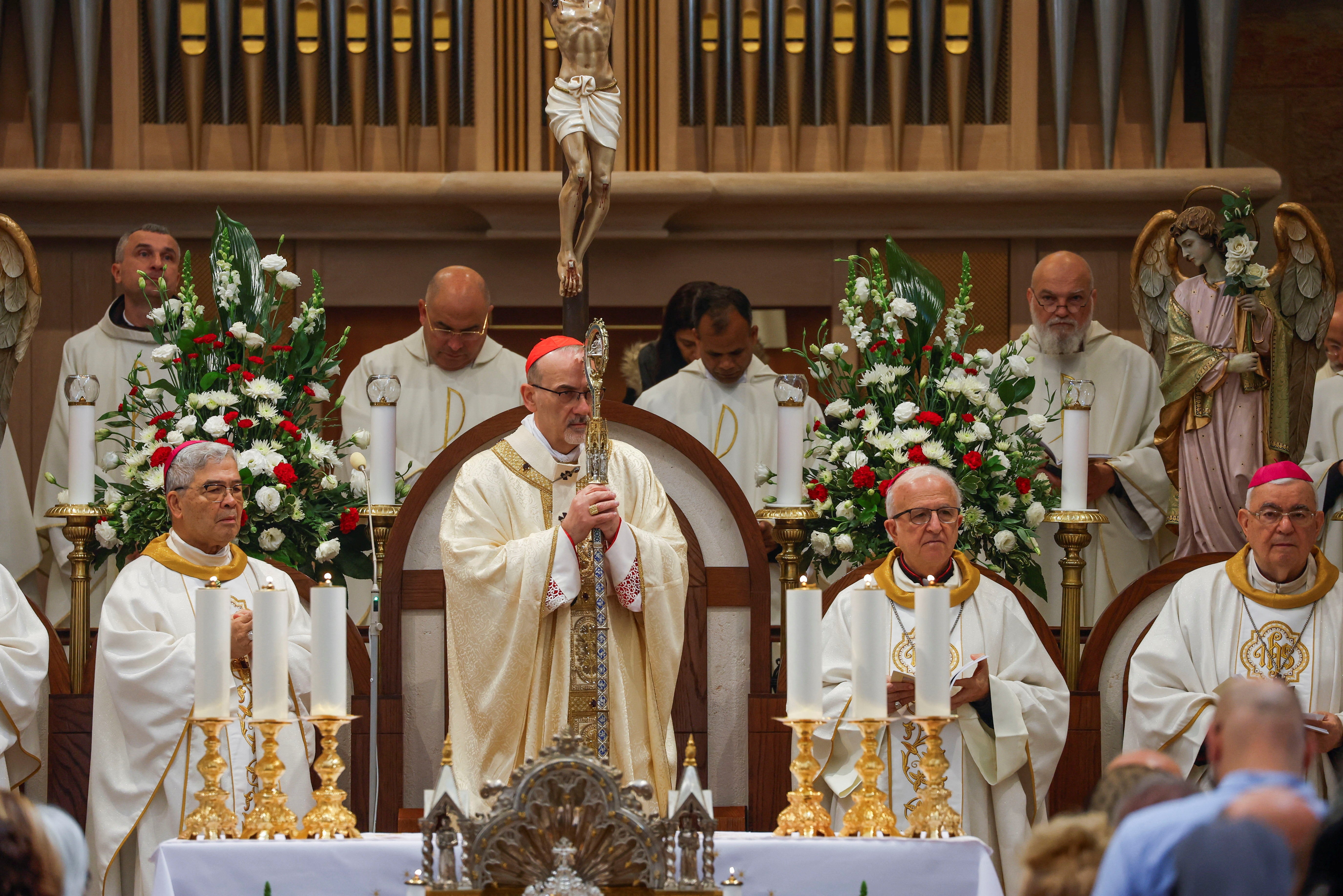 The acting Latin Patriarch of Jerusalem Pierbattista Pizzaballa attends a morning Mass at Saint Catherine's Church, in the Church of the Nativity, in Bethlehem, in the Israeli-occupied West Bank December 25, 2025. REUTERS/Mussa Qawasma