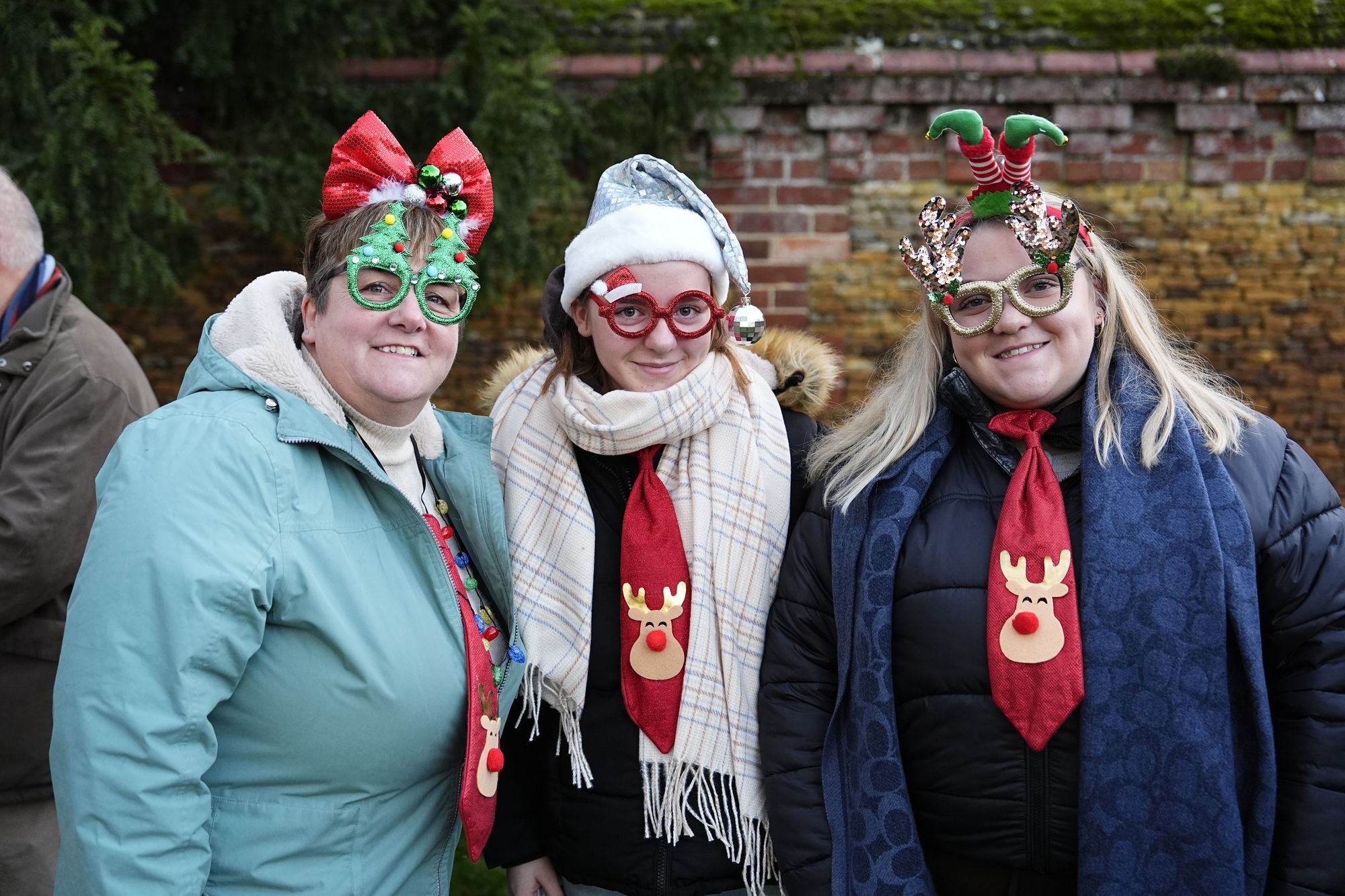 Members of the public wait for the royals to arrive at St Mary Magdalene