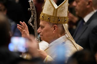 Pope Leo XIV presides over Christmas Day Mass at the St. Peter's Basilica at the Vatican, Thursday, Dec. 25, 2025. (AP Photo/Gregorio Borgia)