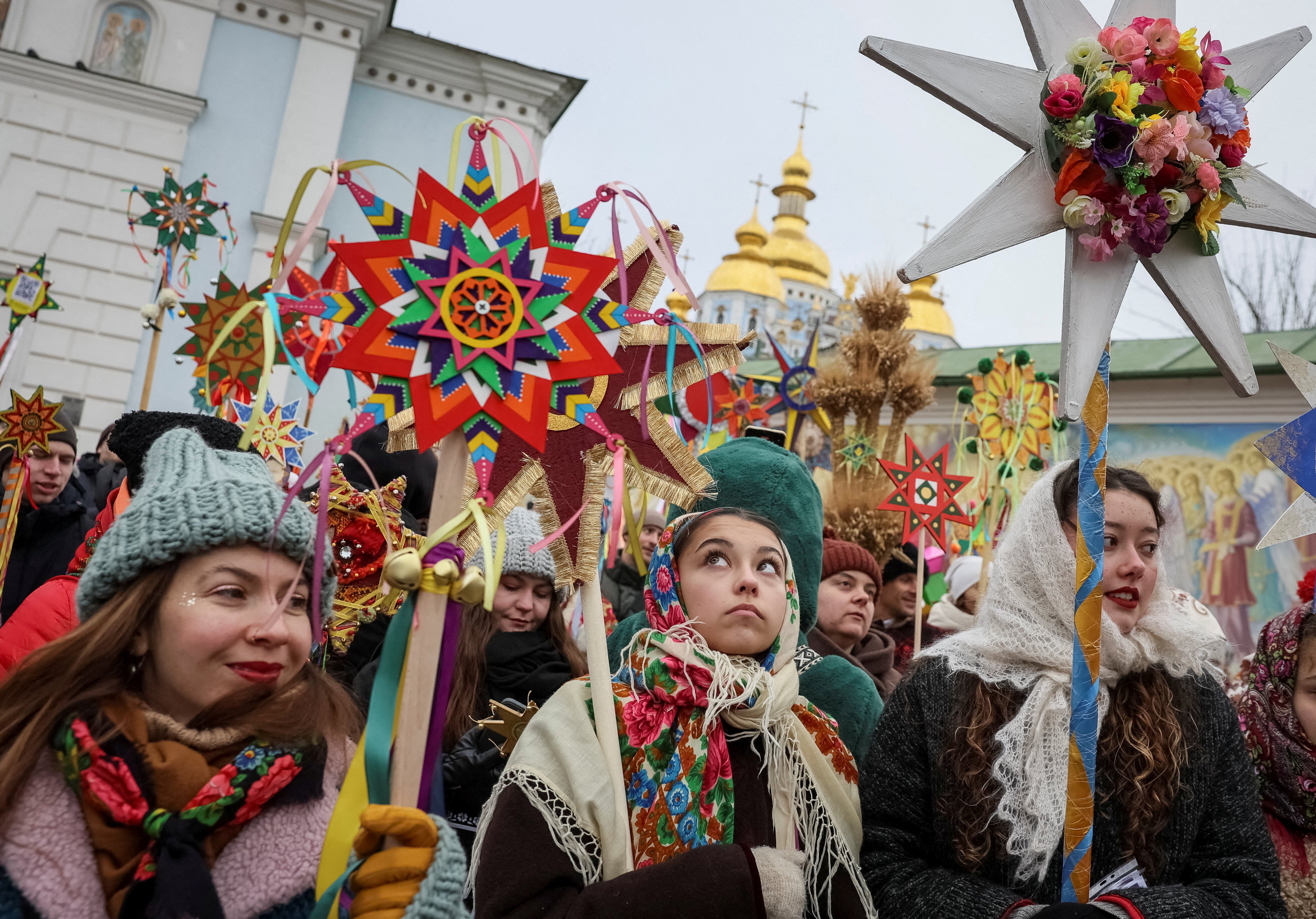 People dressed in traditional Ukrainian costumes attend Christmas celebrations in Kyiv