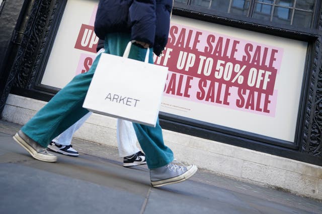 Clothes, shoes and accessories are at the top of shoppers’ wish lists this year, Barclays said (James Manning/PA Archive)