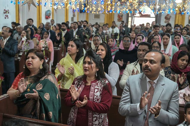 <p>Christians pray during a Christmas mass at a church in Amritsar, India, on 25 December 2025</p>