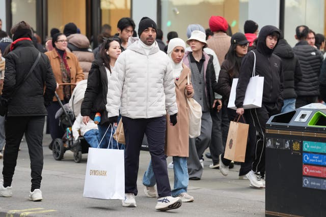 Shoppers on Oxford Street, London, during the Boxing Day sales (Lucy North/PA)