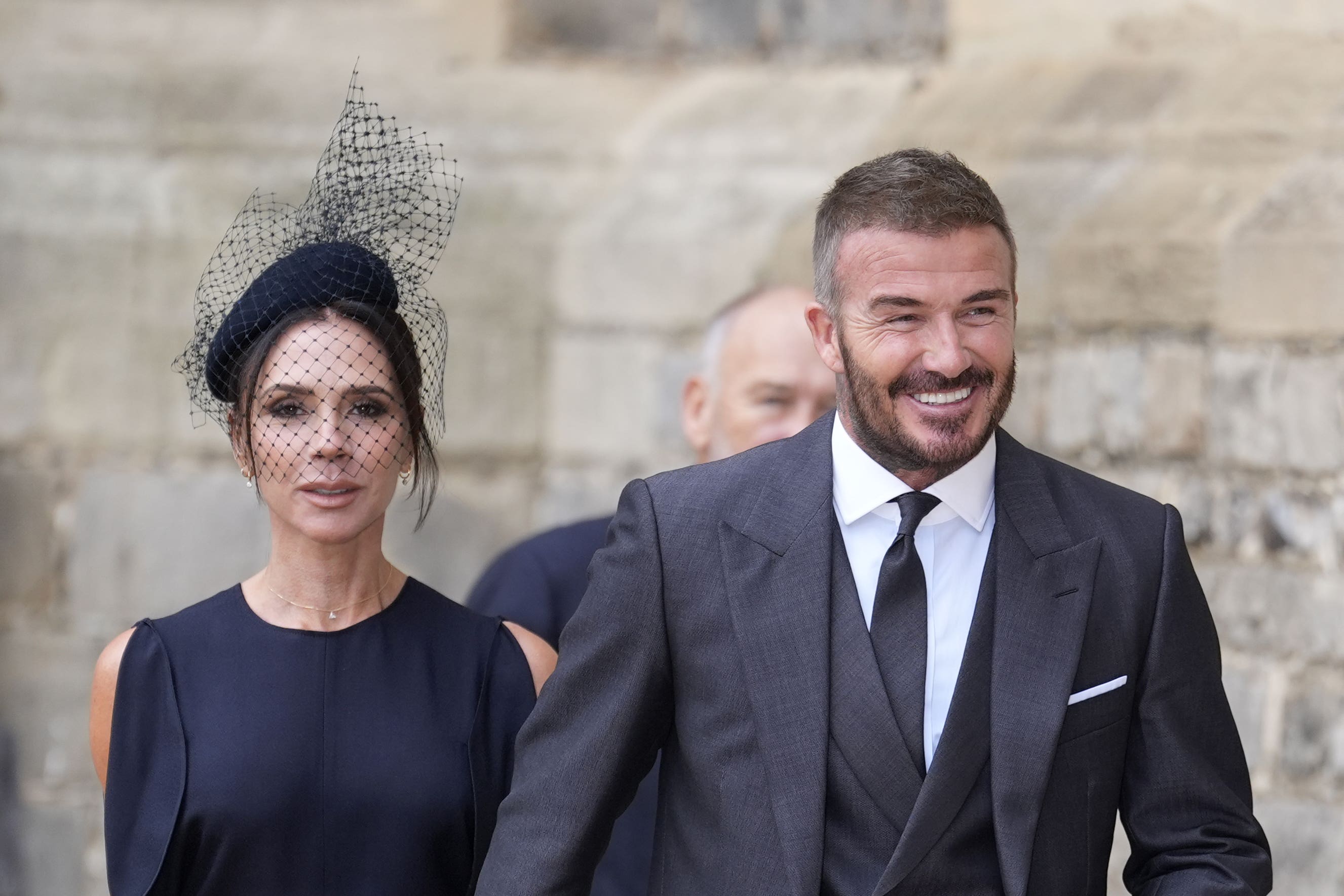 Sir David Beckham, with his wife Lady Victoria arriving for an investiture (Andrew Matthews/PA)