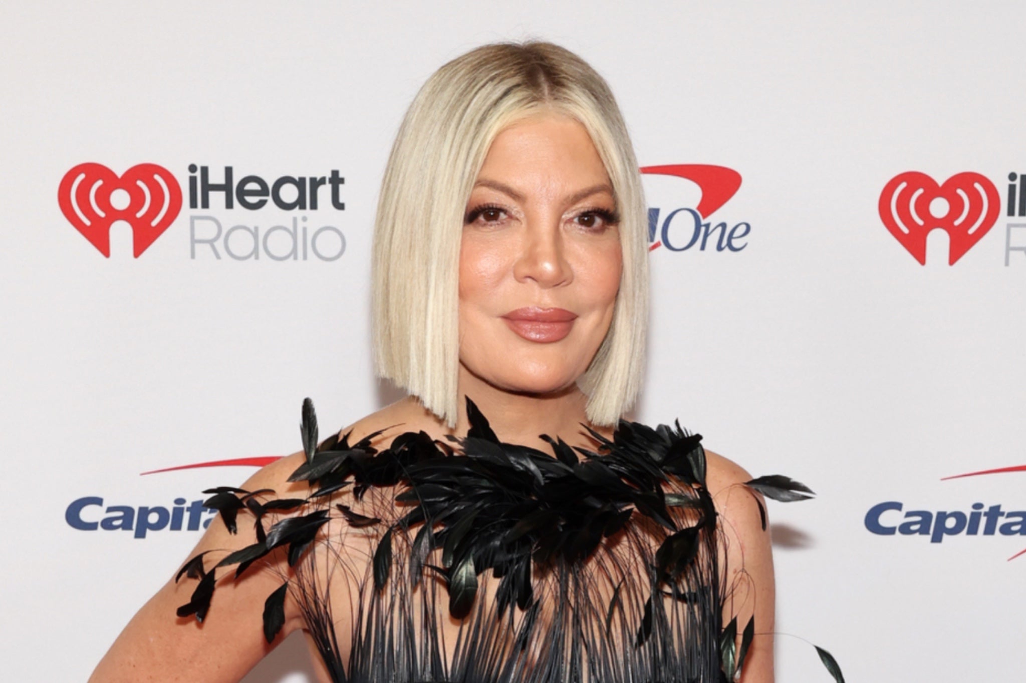 Tori Spelling is postponing her 90s After Dark Party due to illness
