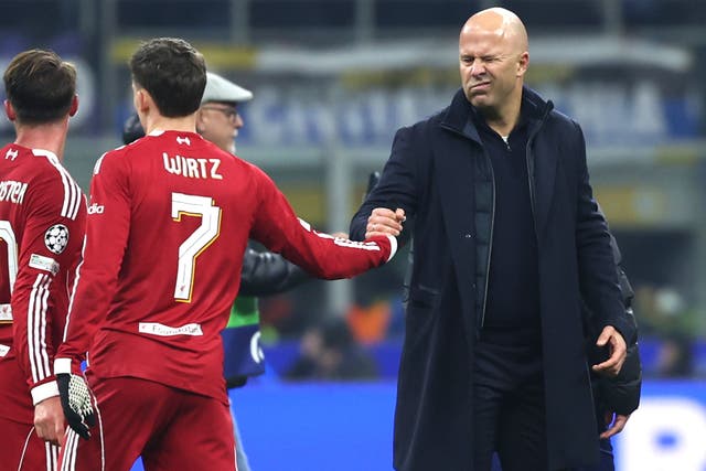 Arne Slot (right) hopes Florian Wirtz can add more goals after breaking his Liverpool duck (Fabrizio Carabelli/PA)