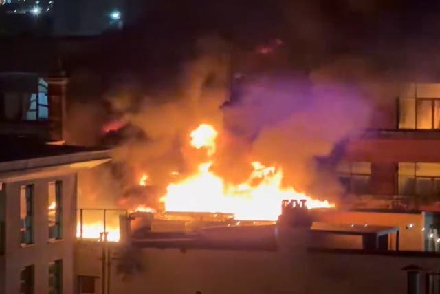 Firefighters were met with a ‘well-developed’ blaze on the fourth floor of a four-storey building housing the Revolver hotel on Saturday evening (@jmsgwd via X/PA)