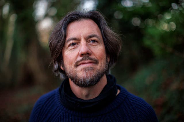 <p>Robert Boake at his home in east Belfast (Liam McBurney/PA).</p>