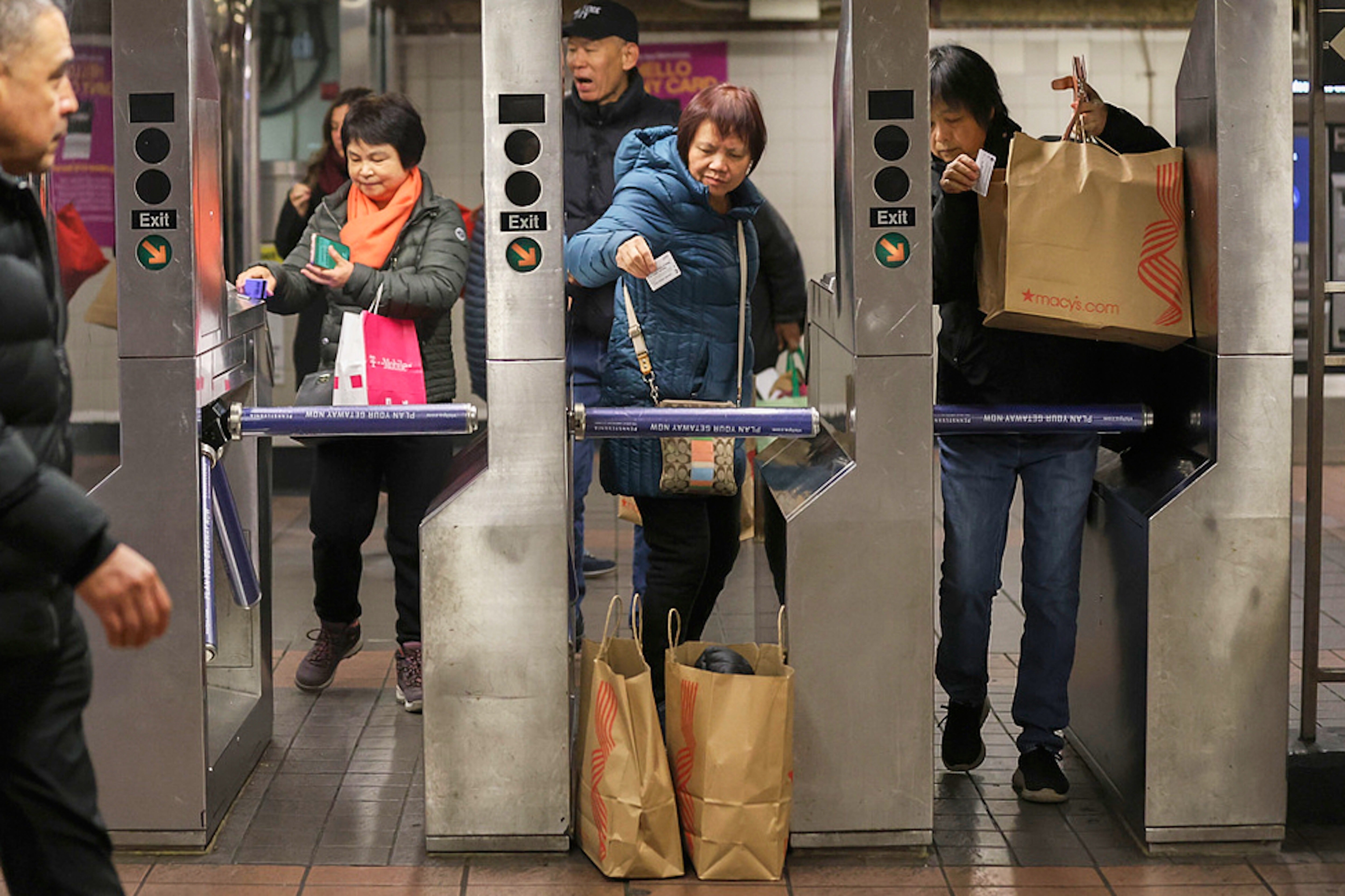 <p>Shoppers swipe their MetroCards as they enter the subway turnstiles, Nov. 29, 2024, in New York. (AP Photo/Heather Khalifa, File)</p>