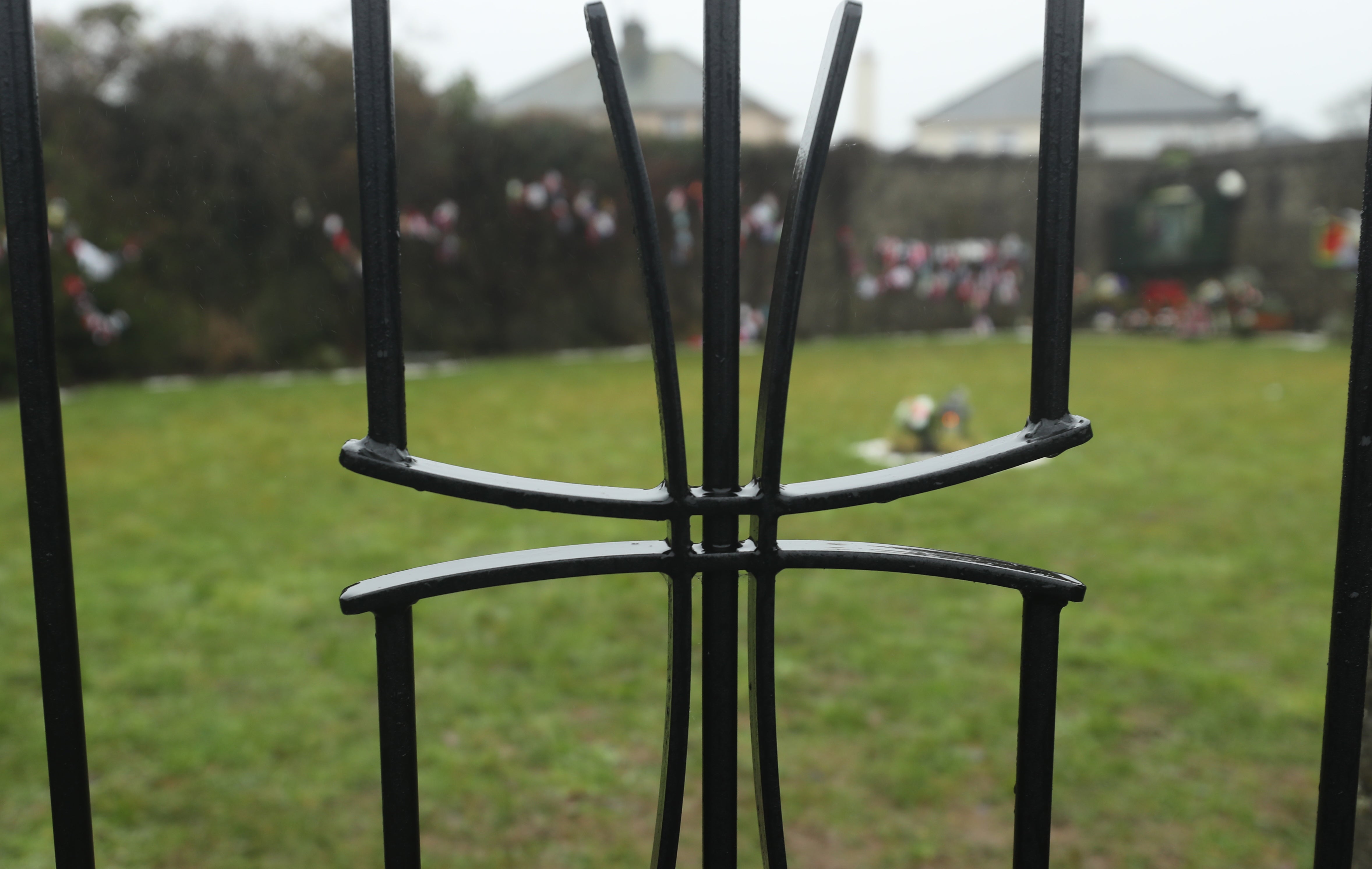 The gates of the grotto on an unmarked mass grave at the site of the Tuam Mother and Baby Home run by the Bon Secours sisters (Niall Carson/PA)
