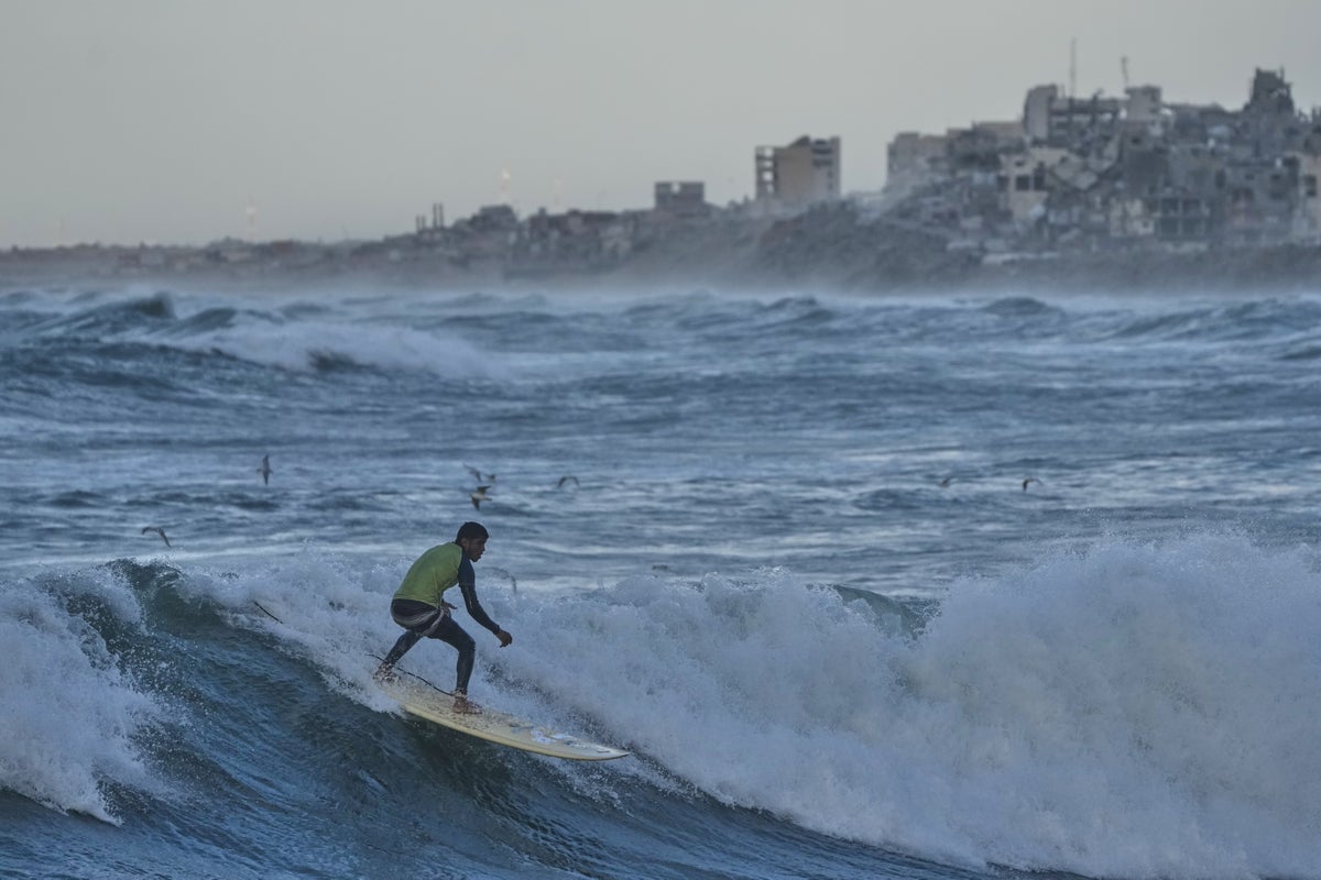 Photos show surfers riding waves along Gaza City&rsquo;s damaged coastline