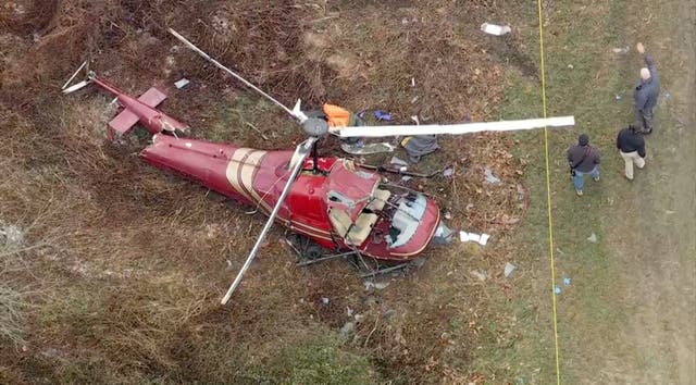 <p>Authorities look over the scene after two helicopters crashed in Hammonton, N.J., on Sunday, Dec. 28, 2025. (WPVI-TV/6ABC via AP)</p>