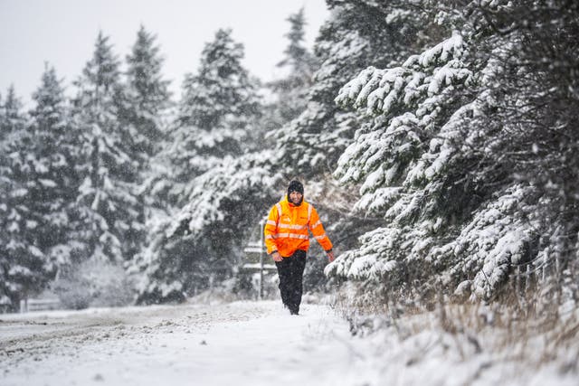 A National Highways employee on the A169 in the North York Moors in November. (Danny Lawson/PA)