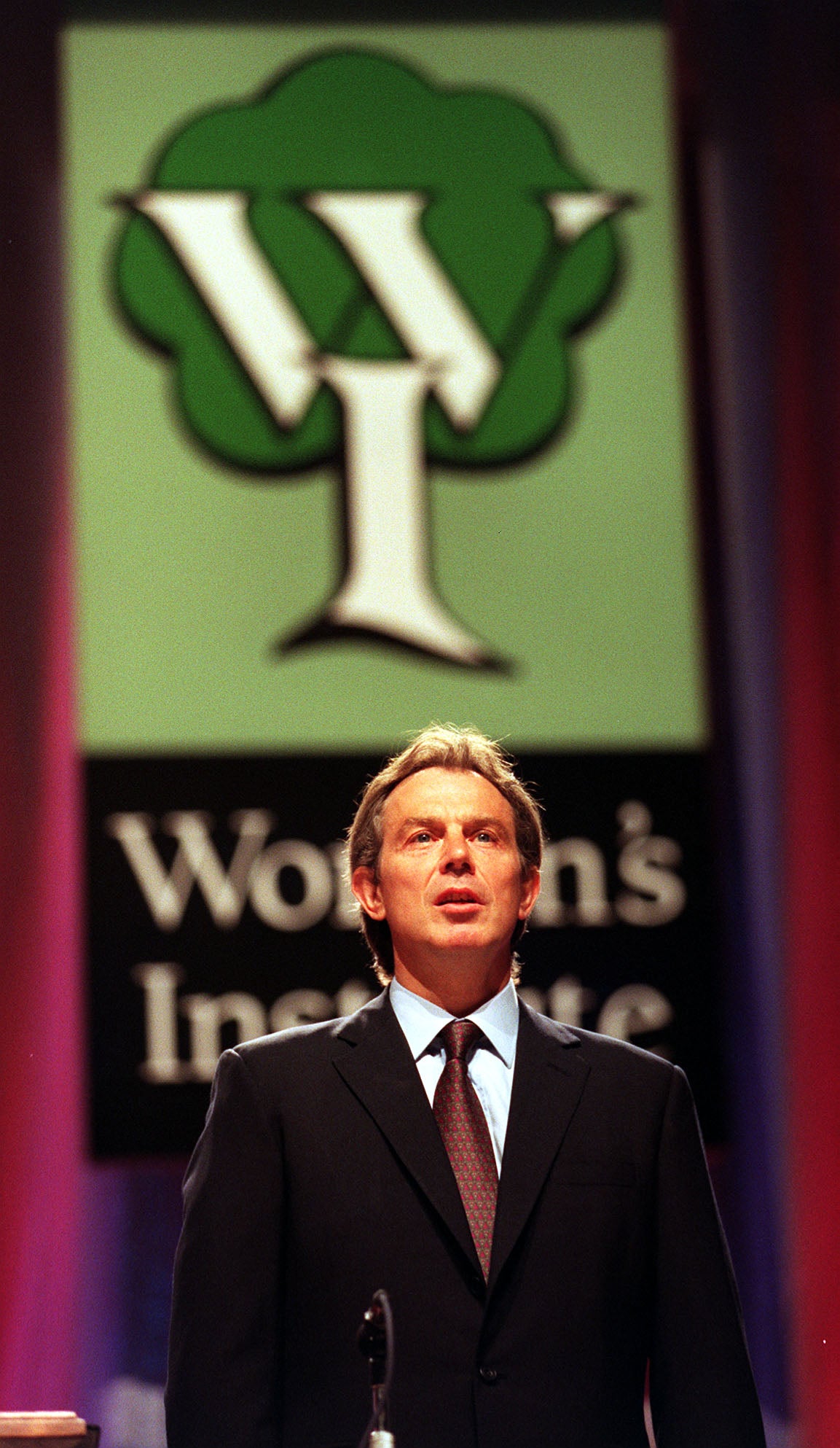 Prime Minister Tony Blair singing "Jerusalem" before he gives a speech at the Women's Institute annual conference in Wembley, London