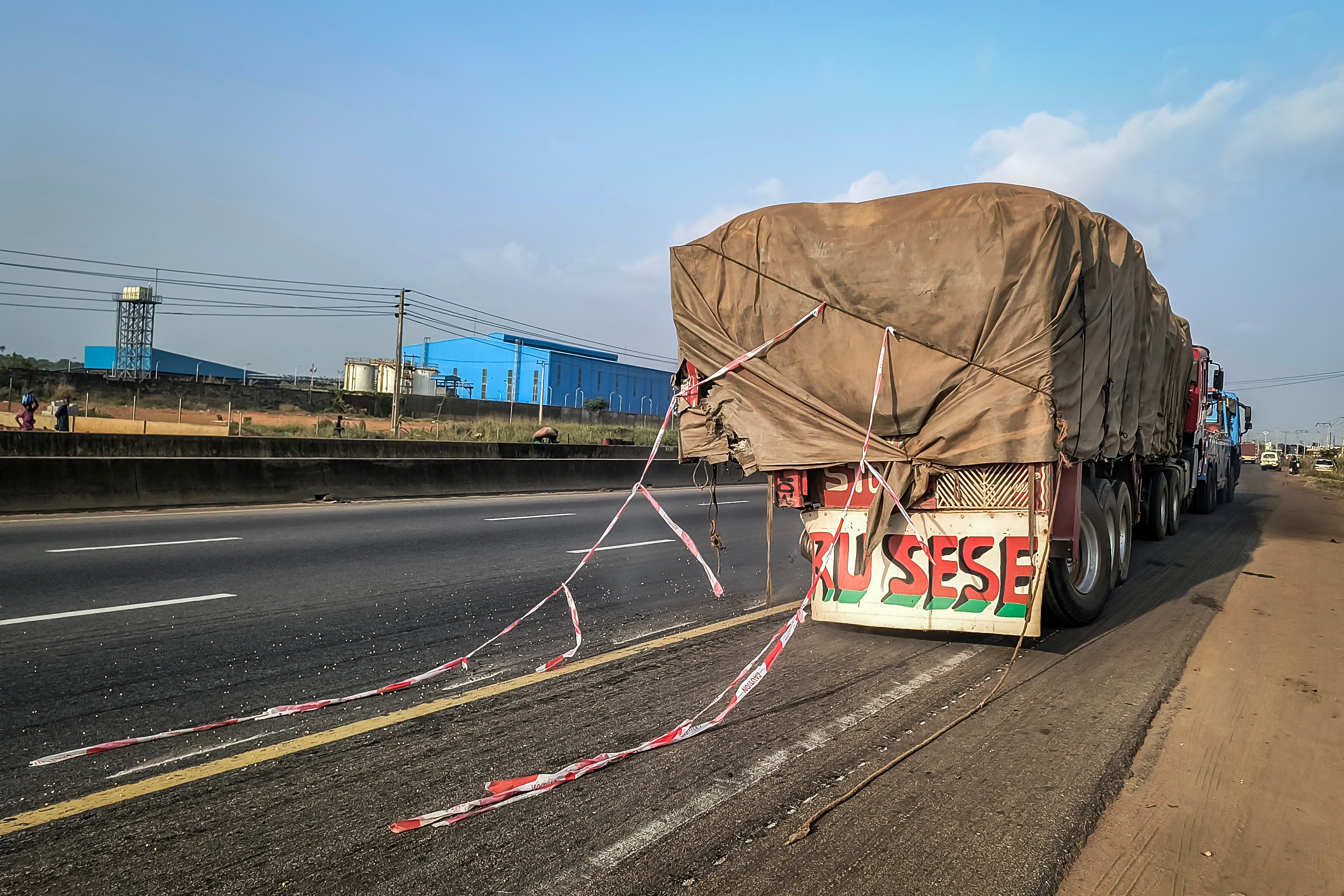 A damaged 18-wheeler truck is seen on the side of the road after a crash involving British boxer Anthony Joshua on the Lagos-Ibadan Expressway near Sagamu on December 29, 2025
