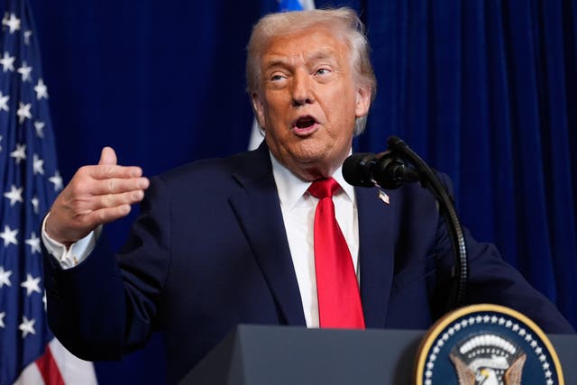 <p>President Donald Trump holds courts at Monday’s press conference at Mar-a-Lago alongside Benjamin Netanyahu</p>