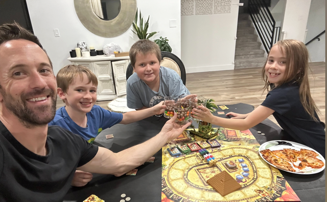 <p>Kendall Seymour with his three kids</p>