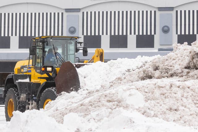 <p>Snow is cleared from a parking lot in Grandville, Mich. on Monday Dec. 29, 2025</p>