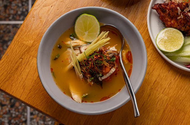 <p>A fragrant, spicy-sour broth that shows why brothy rice bowls feel like comfort food with a point of view</p>