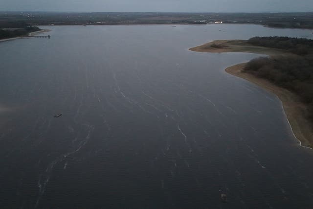<p>A small aircraft entered the water on Sunday (Jonathan Brady/PA)</p>