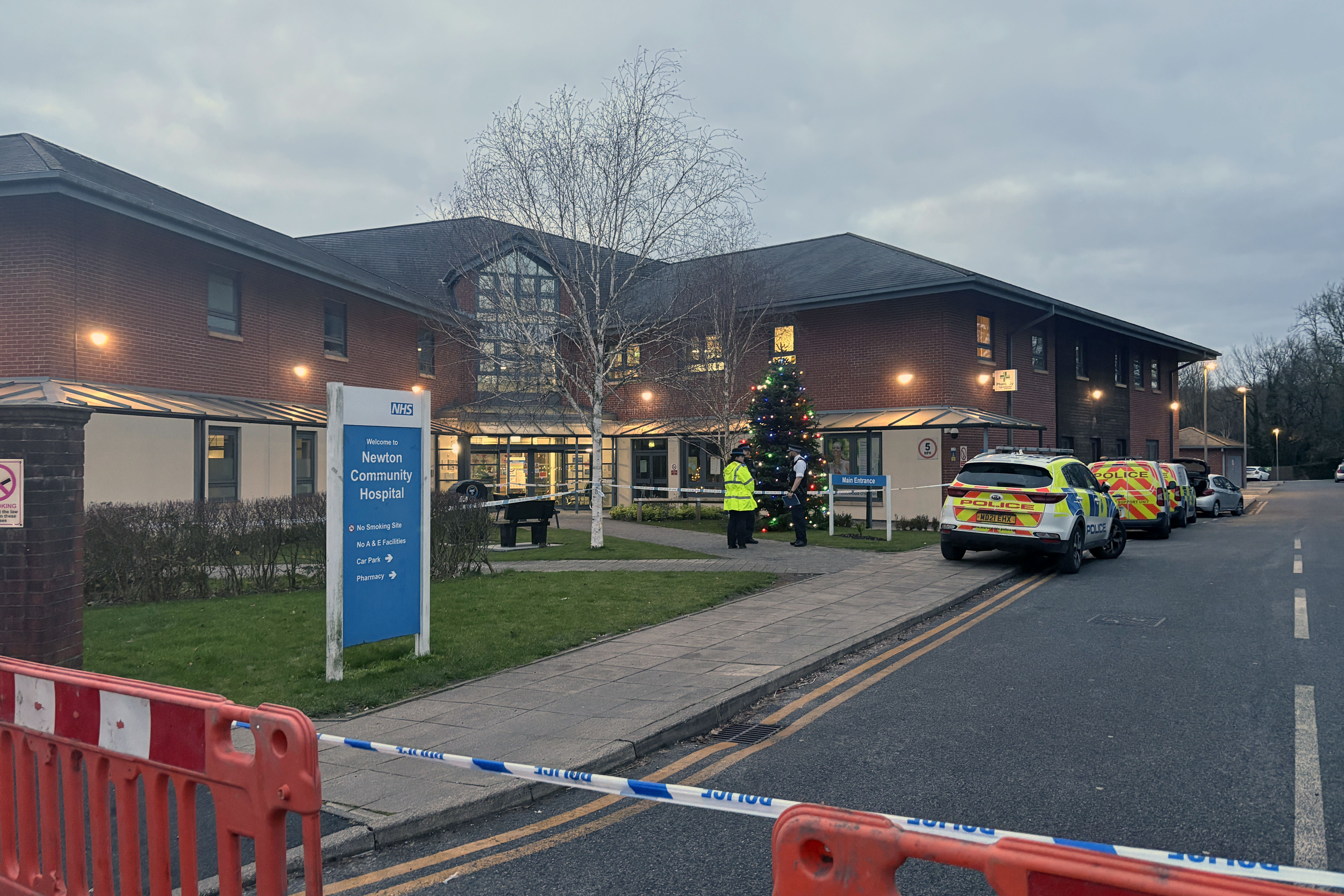Police outside Newton Community Hospital in Merseyside (Eleanor Barlow/PA)