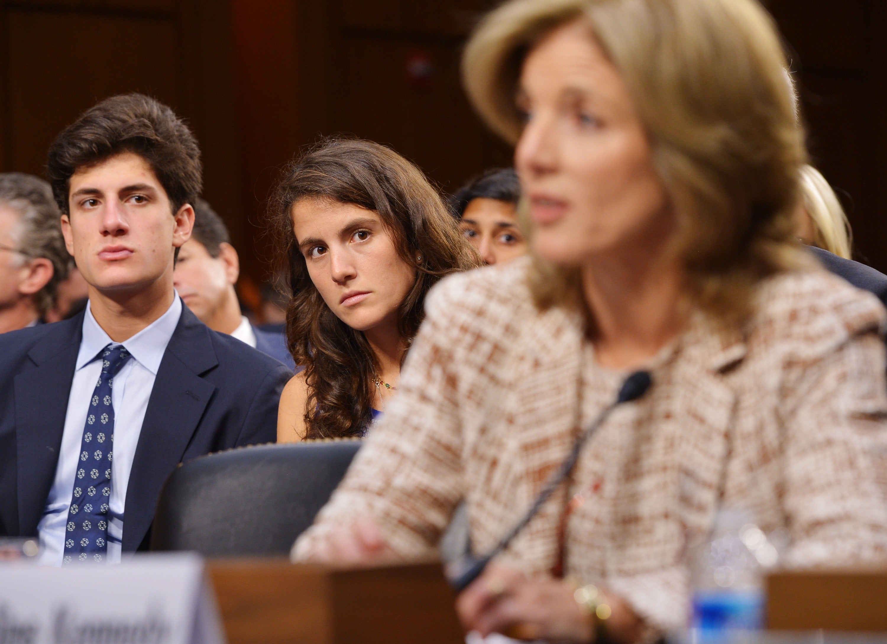 Jack Schlossberg and Tatiana Schlossberg watch as their mother, Caroline Kennedy, testifies before the Senate Foreign Relations Committee in 2012