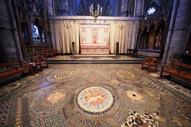 The Coronation Pavement, also known as the Cosmati Pavement, at Westminster Abbey in central London, which researchers say is a slice through a rhombic dodecahedron intended to show harmony (Jonathan Brady/ PA)