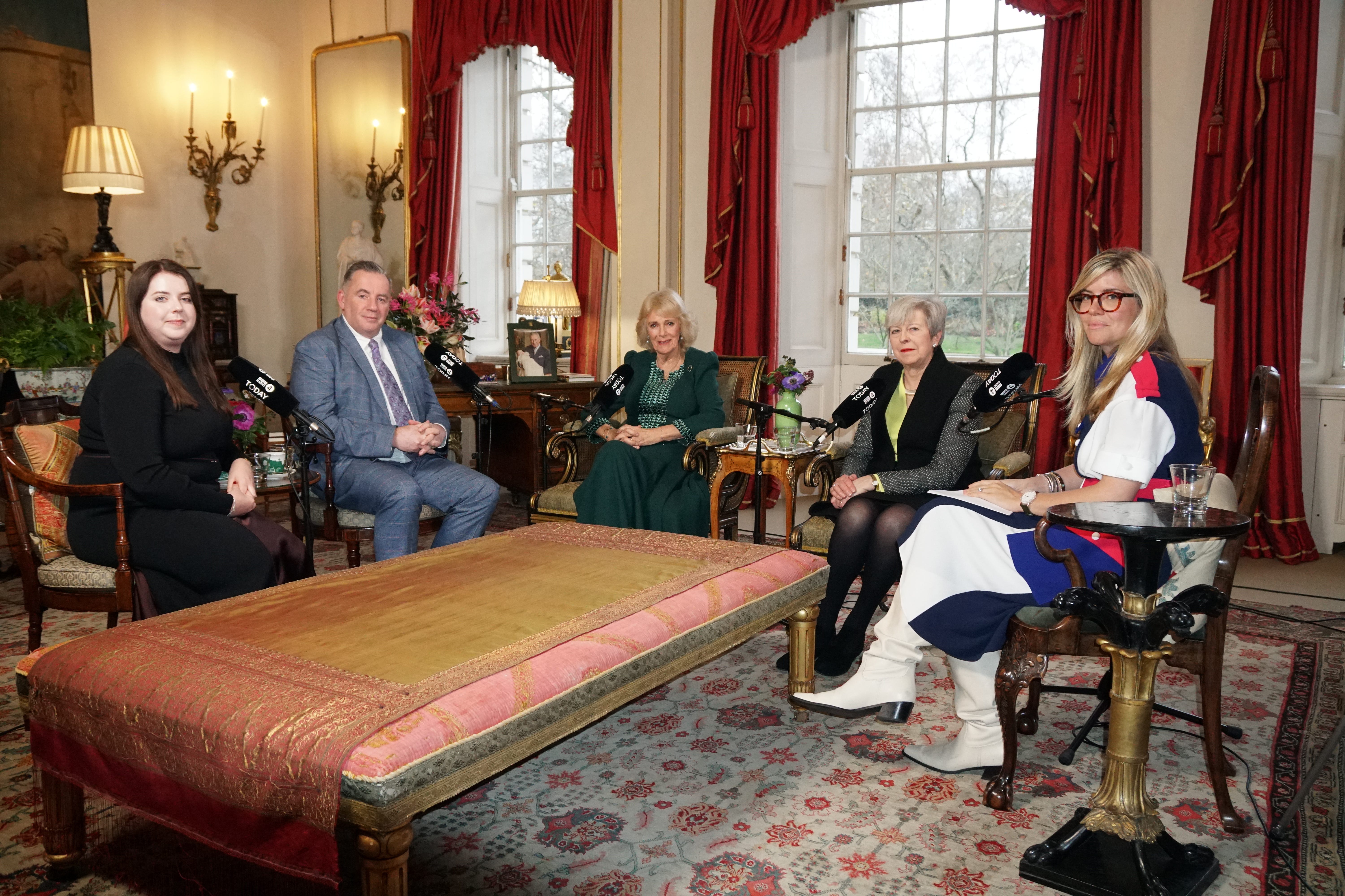 Queen Camilla (centre) with (left to right) Amy Hunt, John Hunt, former prime minister Baroness May and Emma Barnett in the Garden Room of Clarence House, London, during a meeting that forms the basis of a special radio broadcast on New Year’s Eve. The conversation will be broadcast on BBC Radio 4’s Today programme on 31st December 2025, in a special edition guest edited by Baroness May, who has supported the Queen in campaigning to combat sexual and domestic violence (Neil Paton/Buckingham Palace)