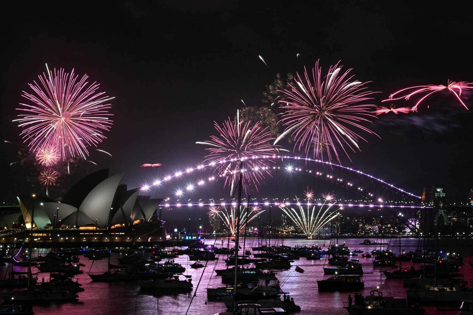 The ‘family fireworks’ – also known as the Country fireworks – are displayed three hours before midnight every year over the Opera House and Sydney Harbour Bridg