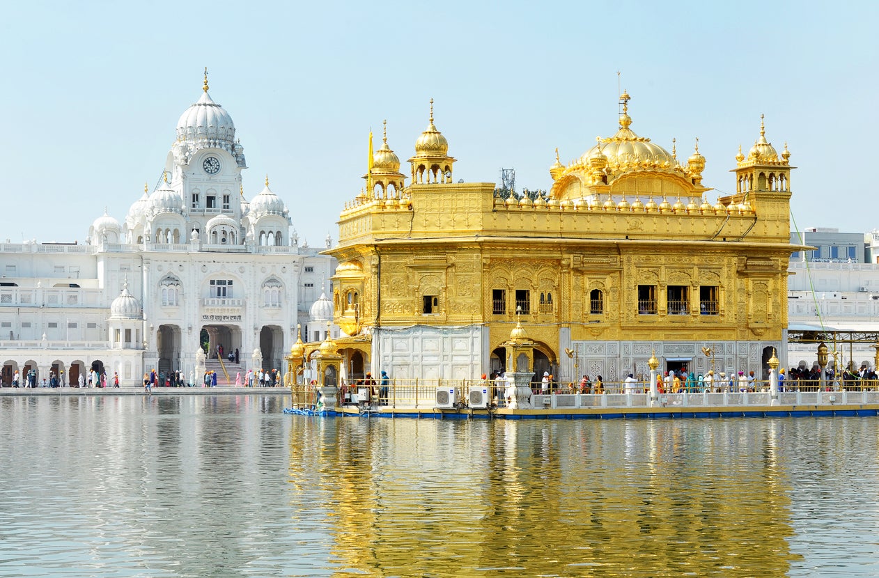 <p>Guiding light: The Golden Temple in Amritsar, by moonlight – an ideal start to a long-haul trip</p>