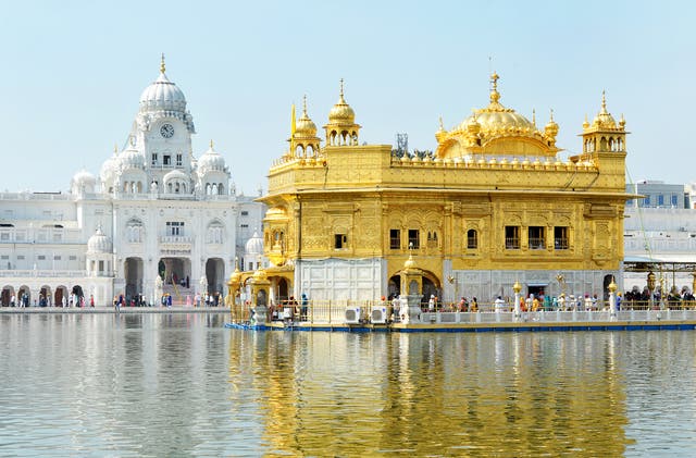 <p>Guiding light: The Golden Temple in Amritsar, by moonlight – an ideal start to a long-haul trip</p>