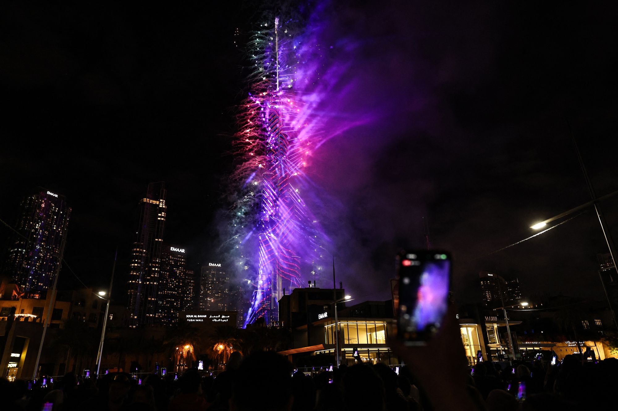 Fireworks light up the sky around the Burj Khalifa Tower, as the UAE welcomes in the New Year, in Dubai on January 1, 2026